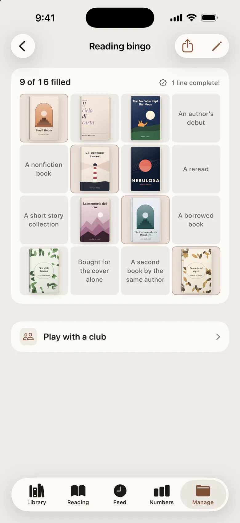 A reading bingo card, with book covers in the squares filled so far.